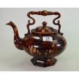 Unusual early 19th century pottery treacle glaze tea pot: A larger item measuring 27 cm wide x 24 cm