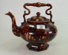 Unusual early 19th century pottery treacle glaze tea pot: A larger item measuring 27 cm wide x 24 cm