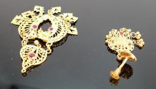 Asian yellow metal ornate pendant & earring: both set with red stones, tests to 22ct gold or higher,