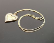 Silver gold colour heart shaped pendant & 18" necklace: 7.2g.