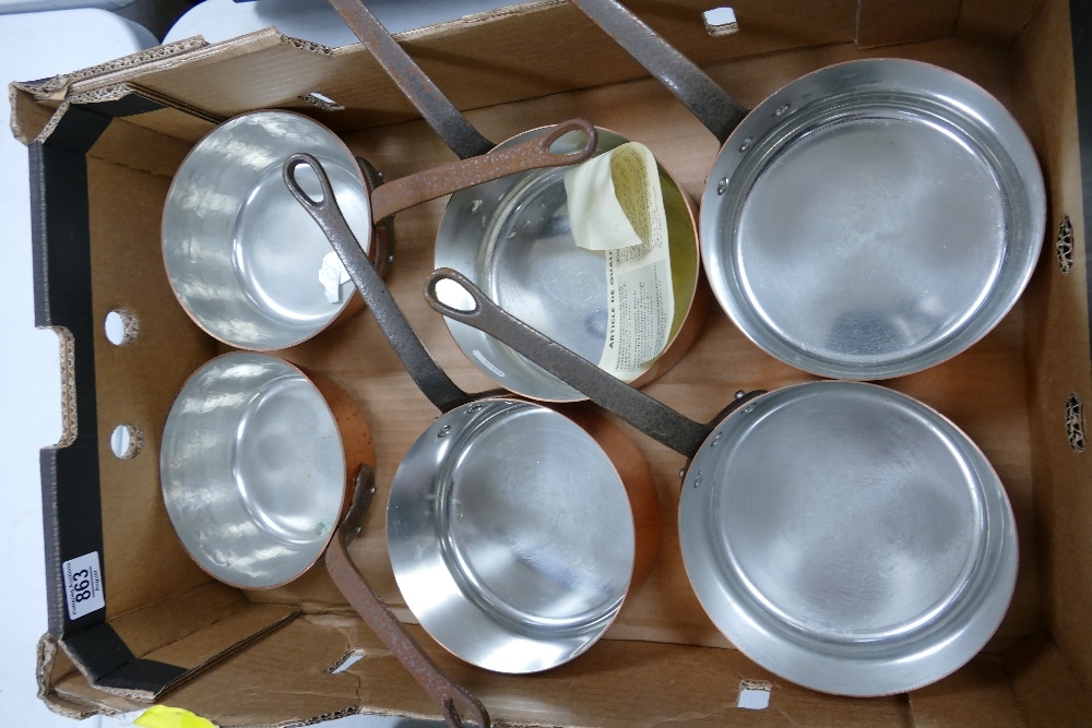 A collection of French Mid Century Copper Cooking Pans: