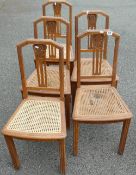 Five Rattan seated Oak Chairs: two in need of repair(5)