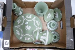 A collection of Wedgwood Sage Green Patterned items to include: Vases, Plate, Candlesticks, dishes