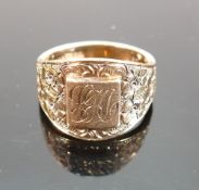 9ct signet ring with floral shoulders: and initialled cartouche , size P/Q, 8.7g.