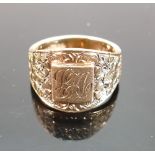 9ct signet ring with floral shoulders: and initialled cartouche , size P/Q, 8.7g.