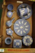 A collection of Wedgwood jasper ware: to include lidded boxes, vases, commemorative plates and jug