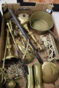 A mixed collection of brass items to include: candlesticks, letter racks, pan, bells, ornaments etc