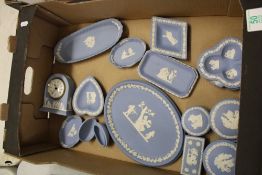 A collection of Wedgwood jasper ware: to include,dressing table tray, mantle clock etc