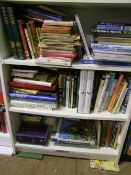 A large collection of books with a Natural World theme: 2 shelves.