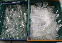 A large quantity of drinking glasses: sherry glasses, aperitif glasses etc (2 trays).