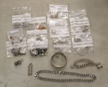 A good collection of hallmarked sterling silver jewellery items: necklaces, bracelets, ingots,