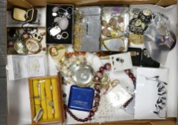 A collection of Costume Jewelry to include: Beads, Brooches, Necklaces etc Gold Earring noted