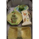 A mixed collection of items to include: Beswick mottled basket, Carton ware fruit bowl and jugs,