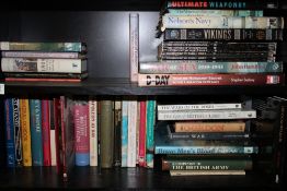 A large collection of books with a War/Military theme: 2 shelves.