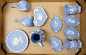 A collection of Wedgwood Jasperware to include: vases, pin trays, lidded boxes etc