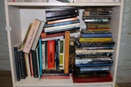 A large collection of books with a History theme: 2 shelves.