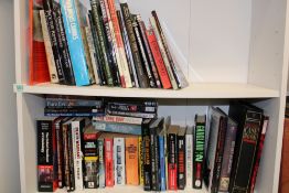 A large collection of books with a Crime theme: 2 shelves.