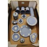 A collection of Wedgwood jasper ware: to include vases, tyg, candlesticks, ashtrays, lidded boxes