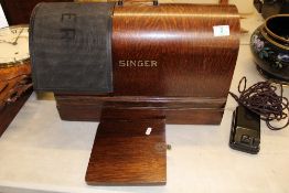 Cased singer sewing machine: with foot switch and mat