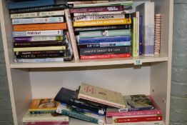 A large collection of books with a Food & Drink theme: 3 shelves.