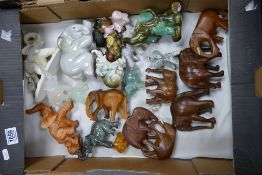 A collection of Stone, Wood, Resin & Pottery Ornamental Elephants: