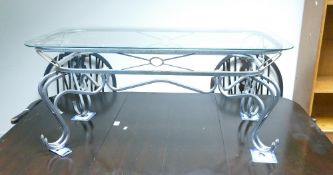 Metal base coffee table: with glass top.