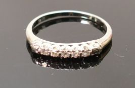 14ct white gold and diamond ring: Weight 1.4g, size J.