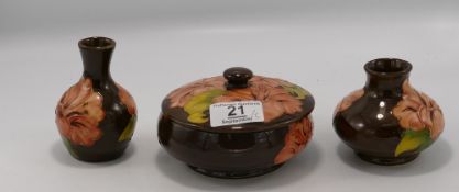 Moorcroft Hibiscus on Brown Ground items to include: Powder Dish & 2 small vases, height of