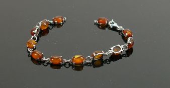 Silver tennis bracelet set with amber, 5.4g:
