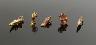 A collection of 9ct gold QVC charms: comprising boot, shoe, parrot etc, 8.8g. (5)