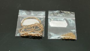 Two 9ct gold neck chains: Gross weight 5g, measuring both 42cm approx. Larger chain actually stamped