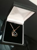 9ct white and yellow heart pendant and 17inch necklace: QVC brand new & boxed, 2g.