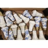 A collection of Nelson Ware sugar sifters: blue & white patterns x 18.