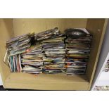 A collection of 45 rpm singles 1970's/1980's mixed genres: viewing advised.