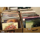 A collection of vinyl records: Rock/Pop etc, Fleetwood Mac, Status Quo, UB40 etc (2 boxes).