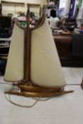 1950's wooden table lamp in the form of a yacht: Length 49cm.