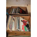 A large collection of vinyl albums including: George Benson, Bee Gees, The Shadows, Tina Turner