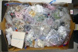 A large collection of new costume jewelry : to include beads, necklaces, sets etc