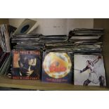 A collection of 45 rpm singles 1970's/1980's mixed genres: viewing advised.