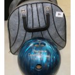 A Brunswick Crown Jewel 10 pin bowling ball in carry holdall: