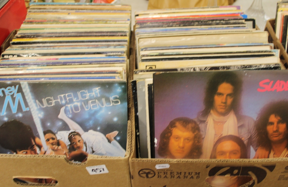 A collection of vinyl records: Rock/Pop etc, Rolling Stones, Boney M, 3 Degrees etc (2 boxes).