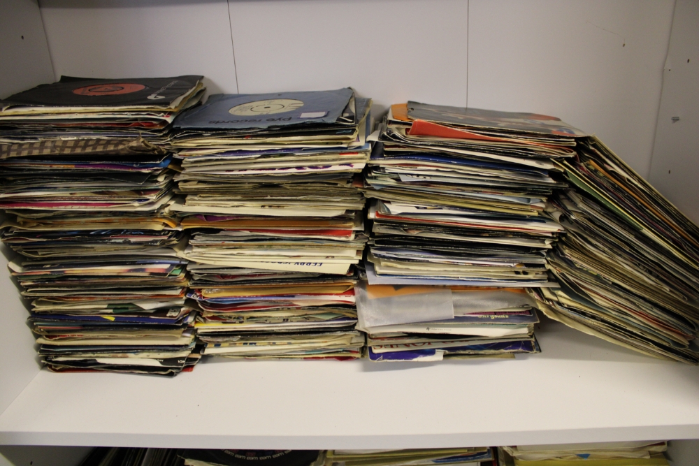 A collection of 45 rpm singles 1960's/1970's/1980's mixed genres: viewing advised.