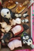 A mixed collection of ceramic and resin animal figures: pandas, pigs, tiger, lion etc (1 tray).