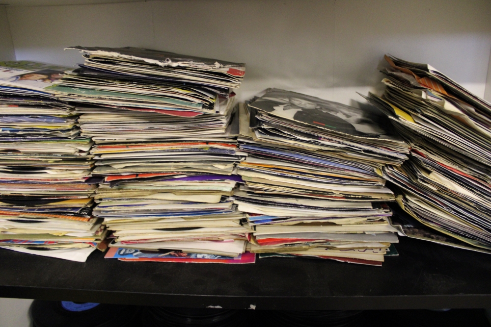 A collection of 45 rpm singles 1970's/1980's mixed genres: viewing advised.