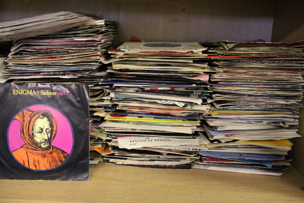 A collection of 45 rpm singles 1970's/1980's mixed genres: viewing advised.