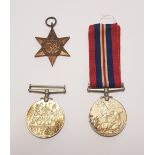 A group of Second World War medals: The 1939 - 1945 Star, Defence Medal & War Medal 1939 - 1945 (3).