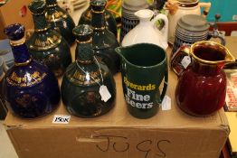 A collection of King of Scots whisky decanters: together with beer steins, water jugs etc (12).