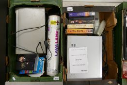 A mixewd collection of items to include: VHS Video Recorders, Tapes, Boxed Lava Lamp etc (2 trays)