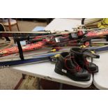 A collection of ski's: asolo sport snow field 2 boots and poles. to include Head, Volka