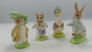 Beswick Beatrix Potter figures: Tom Kitten, Peter Rabbit, Benjamin Bunny and Jemimia Puddleduck.